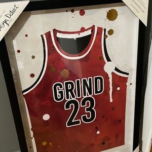 Basketball Jersey Picture that says “Grind 23”